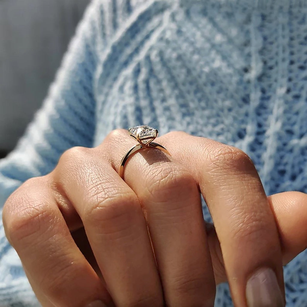 Knife Edge Emerald Cut Solitaire Ring