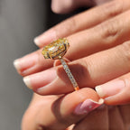 Yellow Oval Moissanite engagement ring in pave set