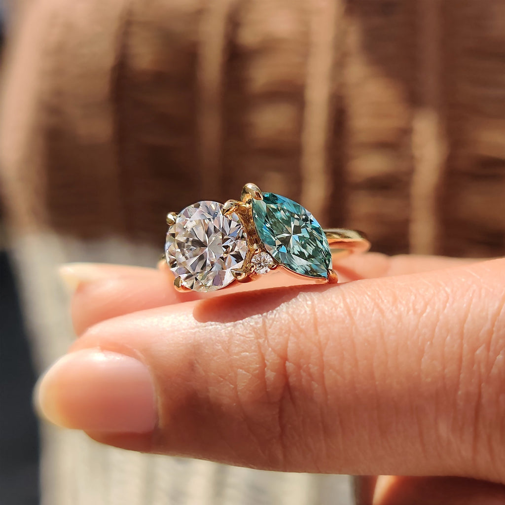Three Stone Moissanite Ring In Marquise And Round Cut
