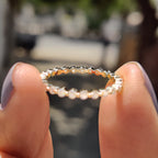 Yellow Gold Eternity Band In Round Cut Moissanite