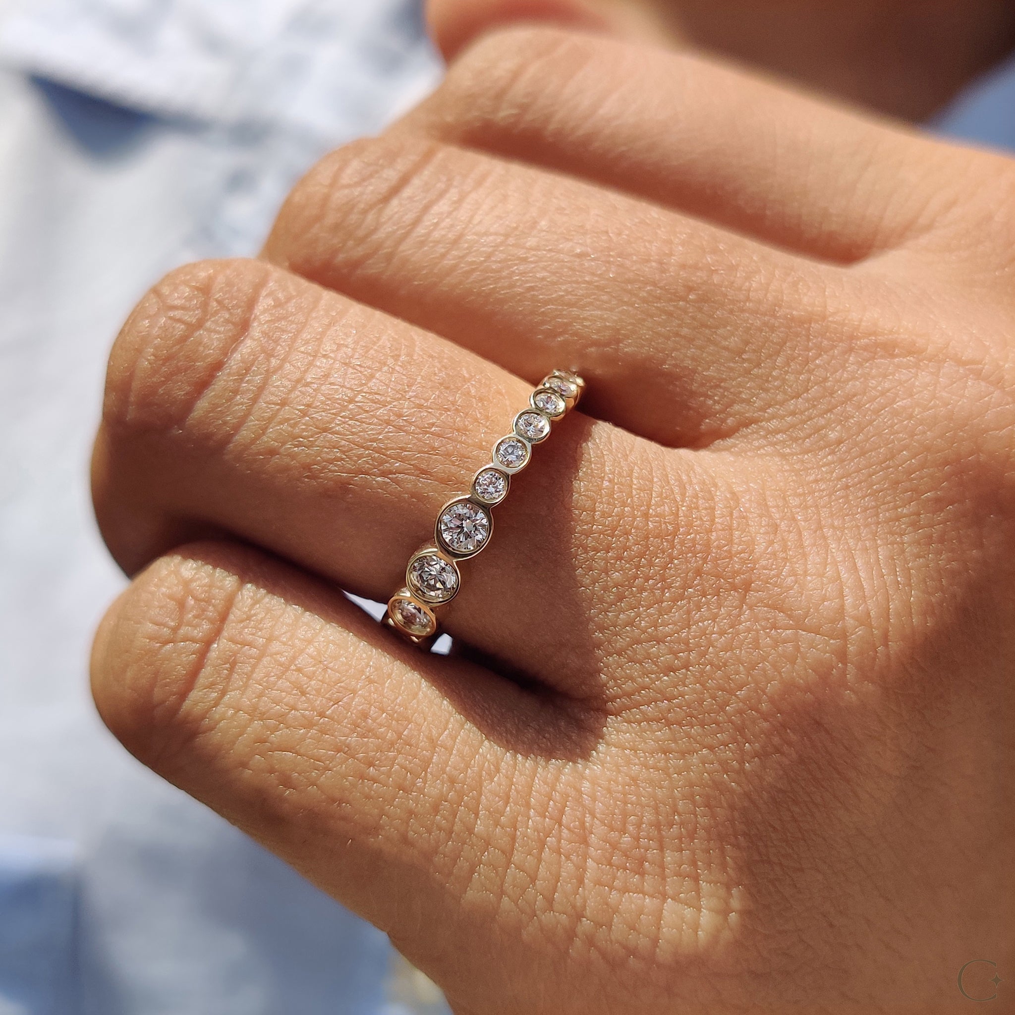 Bezel Set Wedding Band Featuring Round Diamond