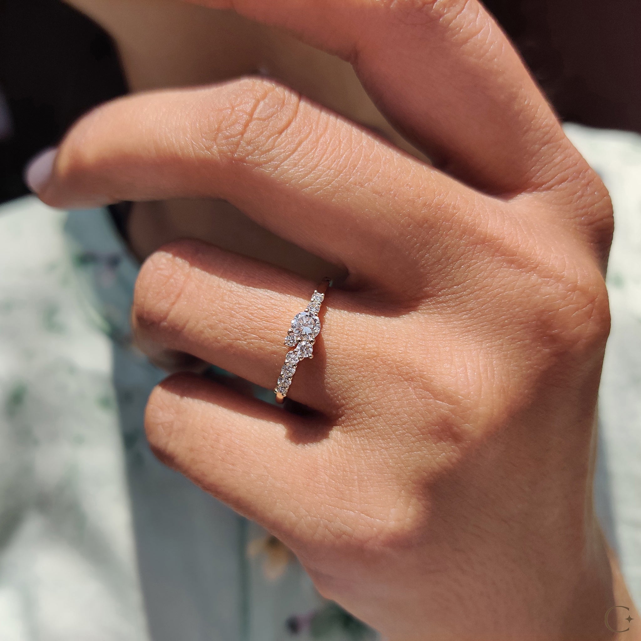 Cluster Engagement Ring With Round Cut Diamond