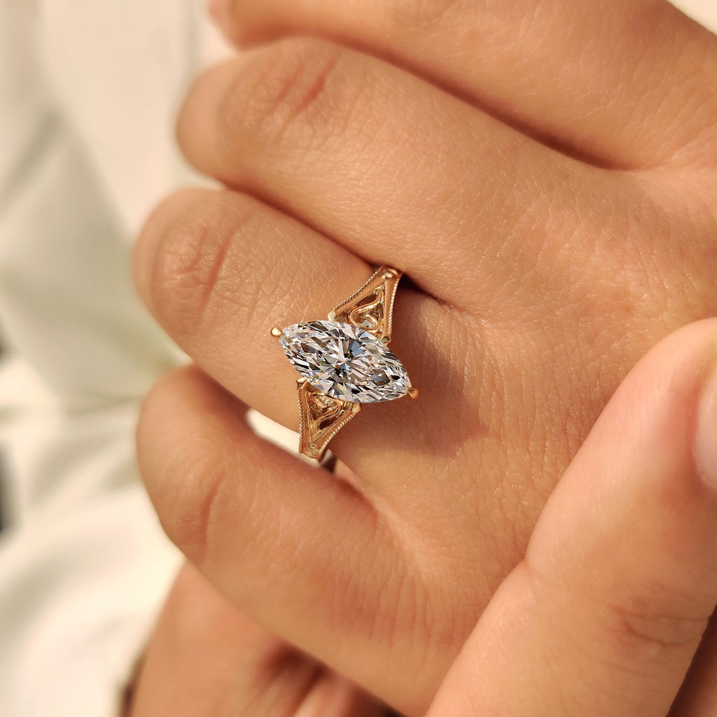 Solitaire Style Marquise Cut Diamond Ring in Milgrain Details