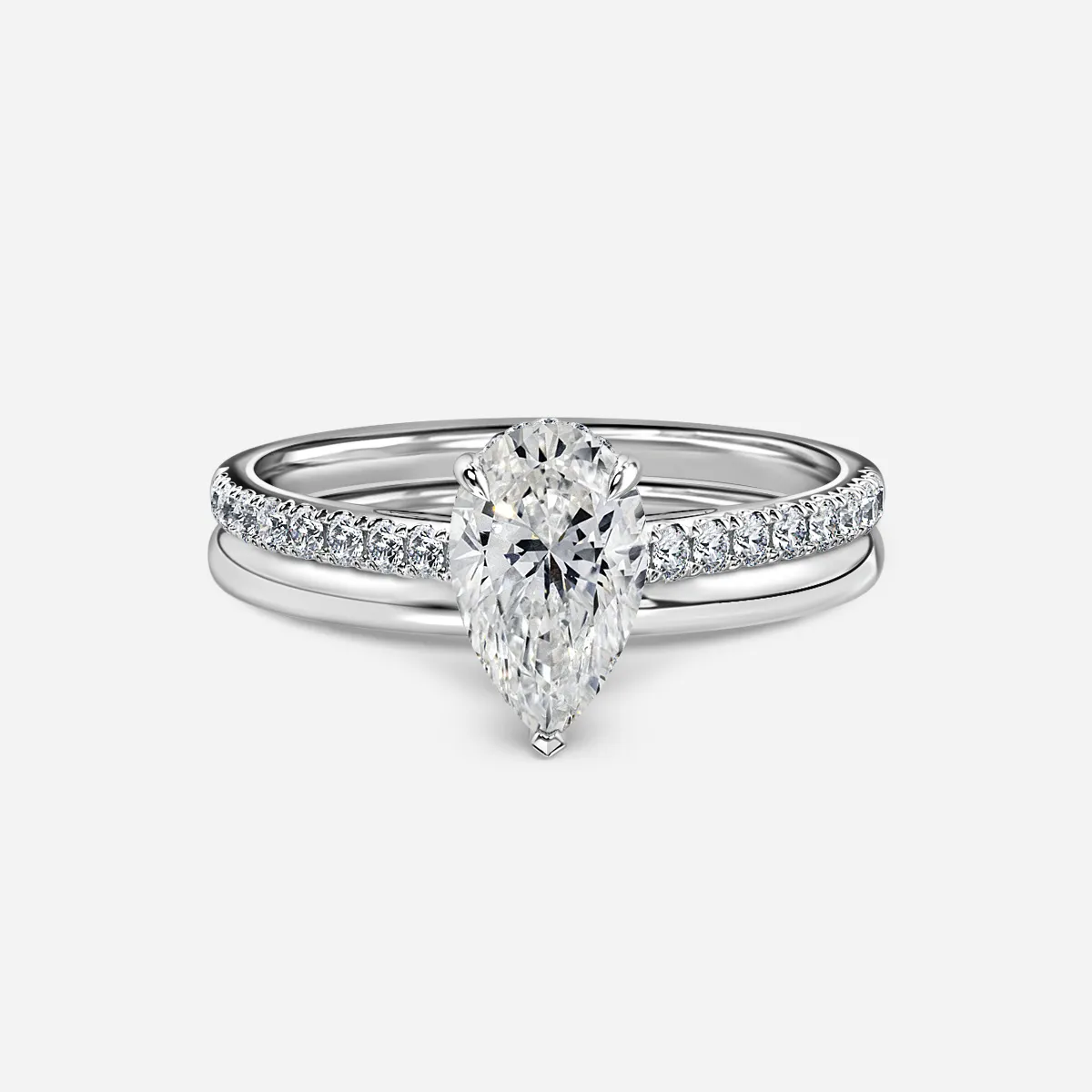 1.0 CT Pear Cut Moissanite Hidden Halo & Pave Bridal Ring Set Main image