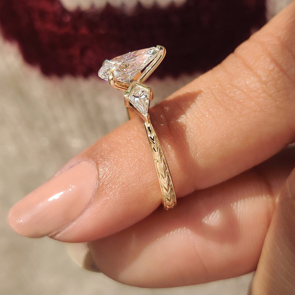 Pear and Kite Cut Three Diamond Ring with Art Deco Band