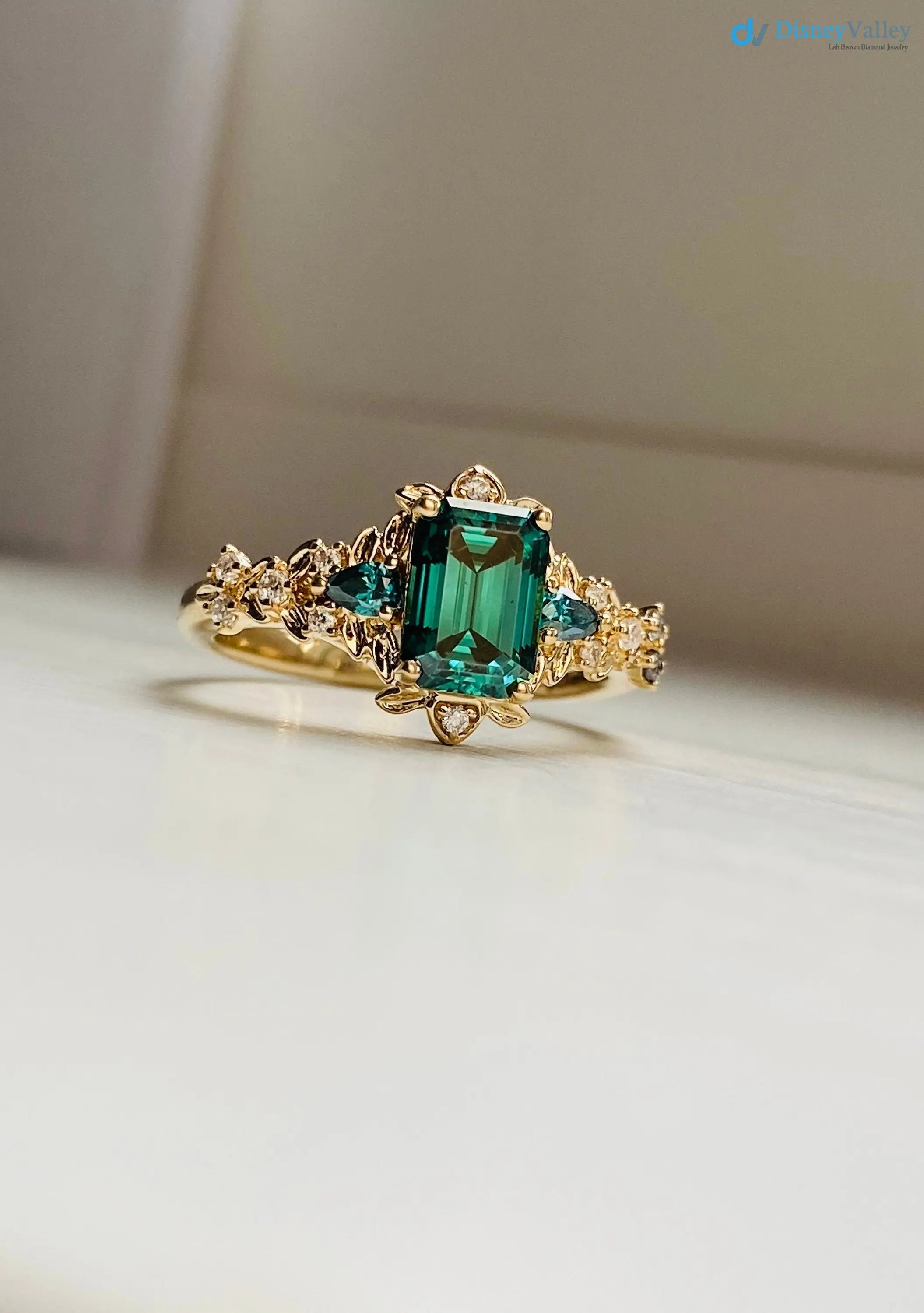 Arwen green Emerald parti lab grown engagement ring - DisneyValley Main image