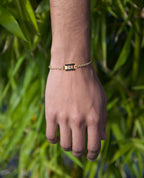 LA PAZ Gold Charm Bracelet with 0.20ct Black Diamonds