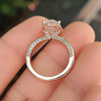 Oval Cut Diamond Ring in Round Cut Diamond Basket Setting