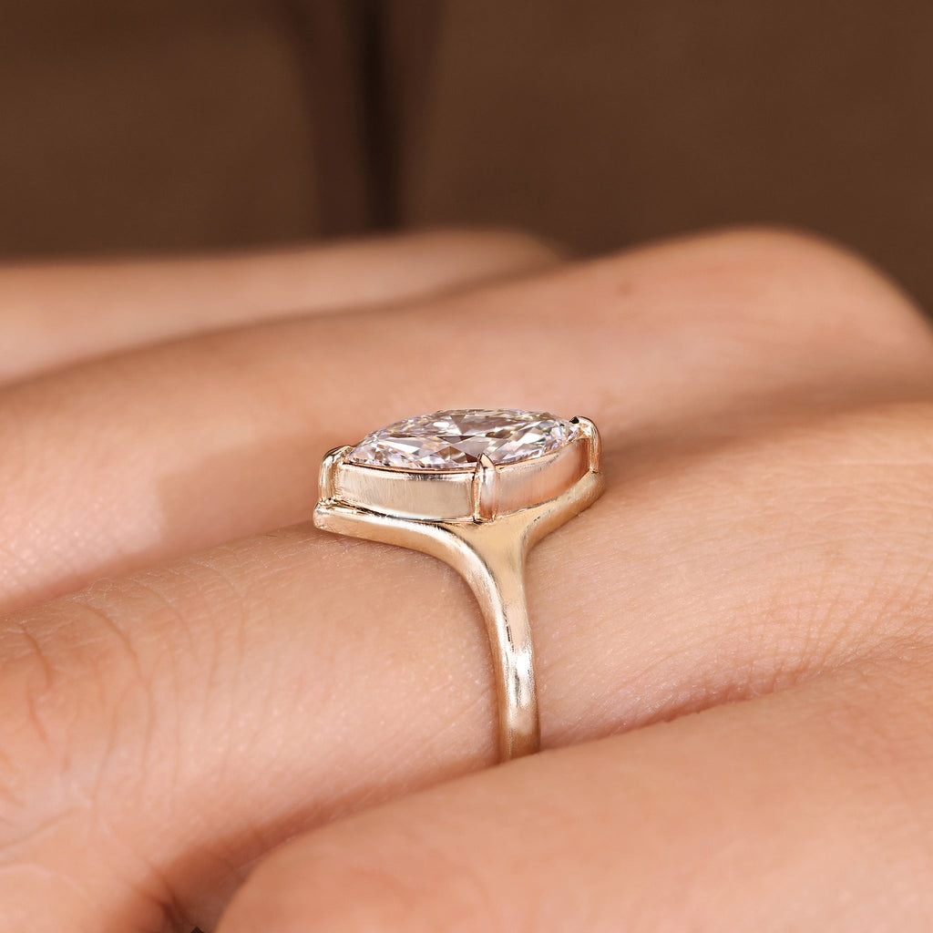 Marquise Cut Diamond Engagement Ring in Bezel Setting