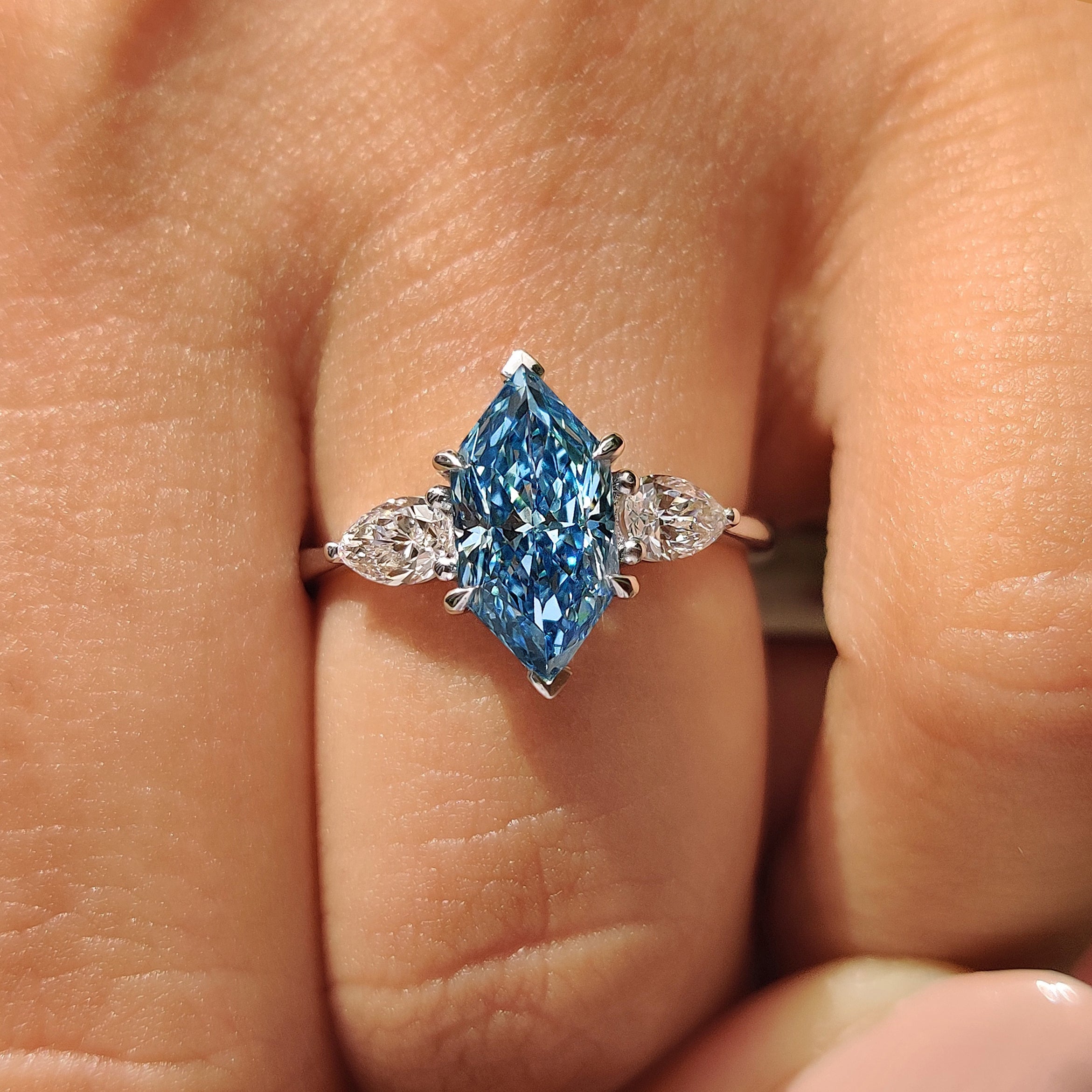 Blue Dutch Marquise Three Stone Ring with Pear Side Stones Secondary image