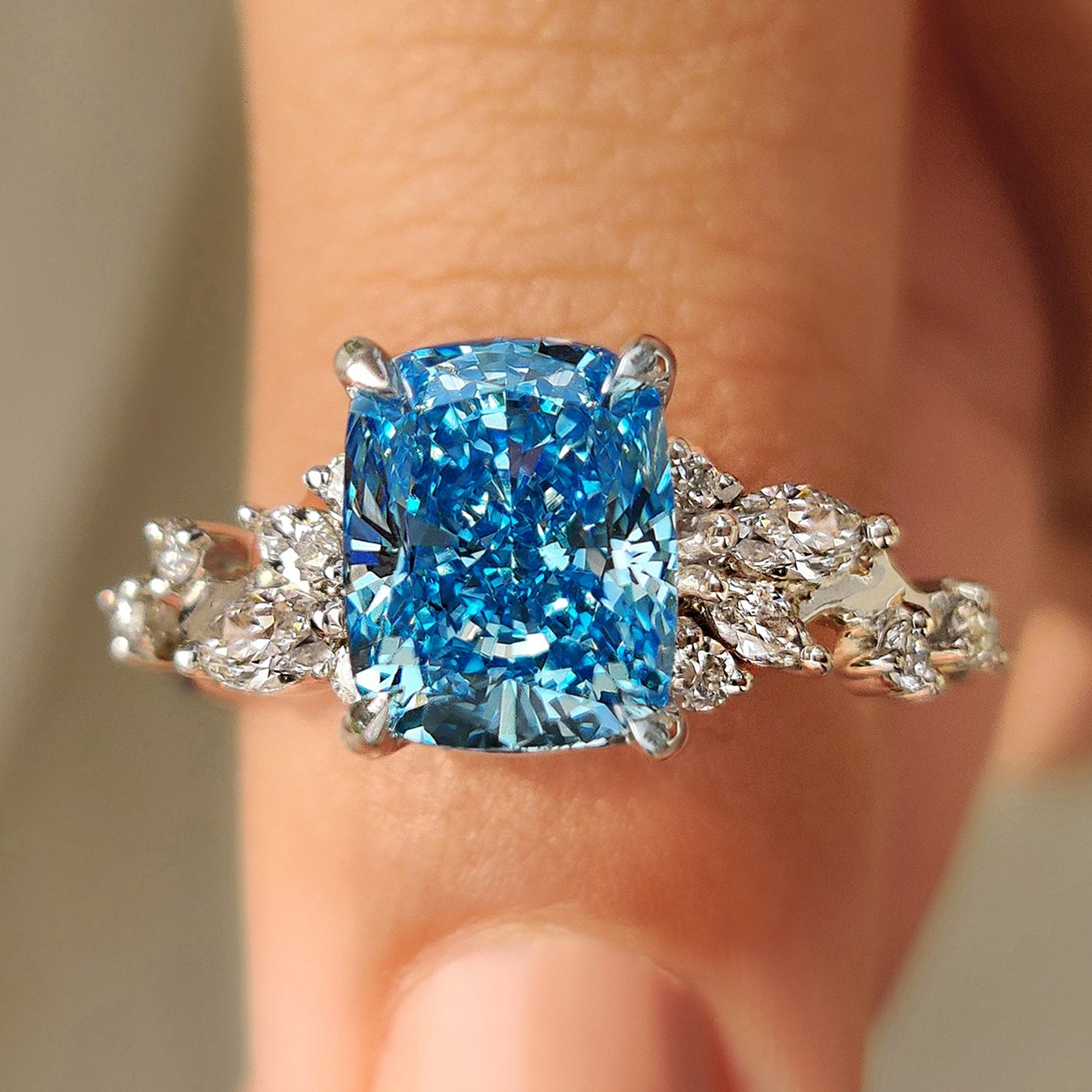 Blue Cushion Cut Diamond Ring in Cluster Setting