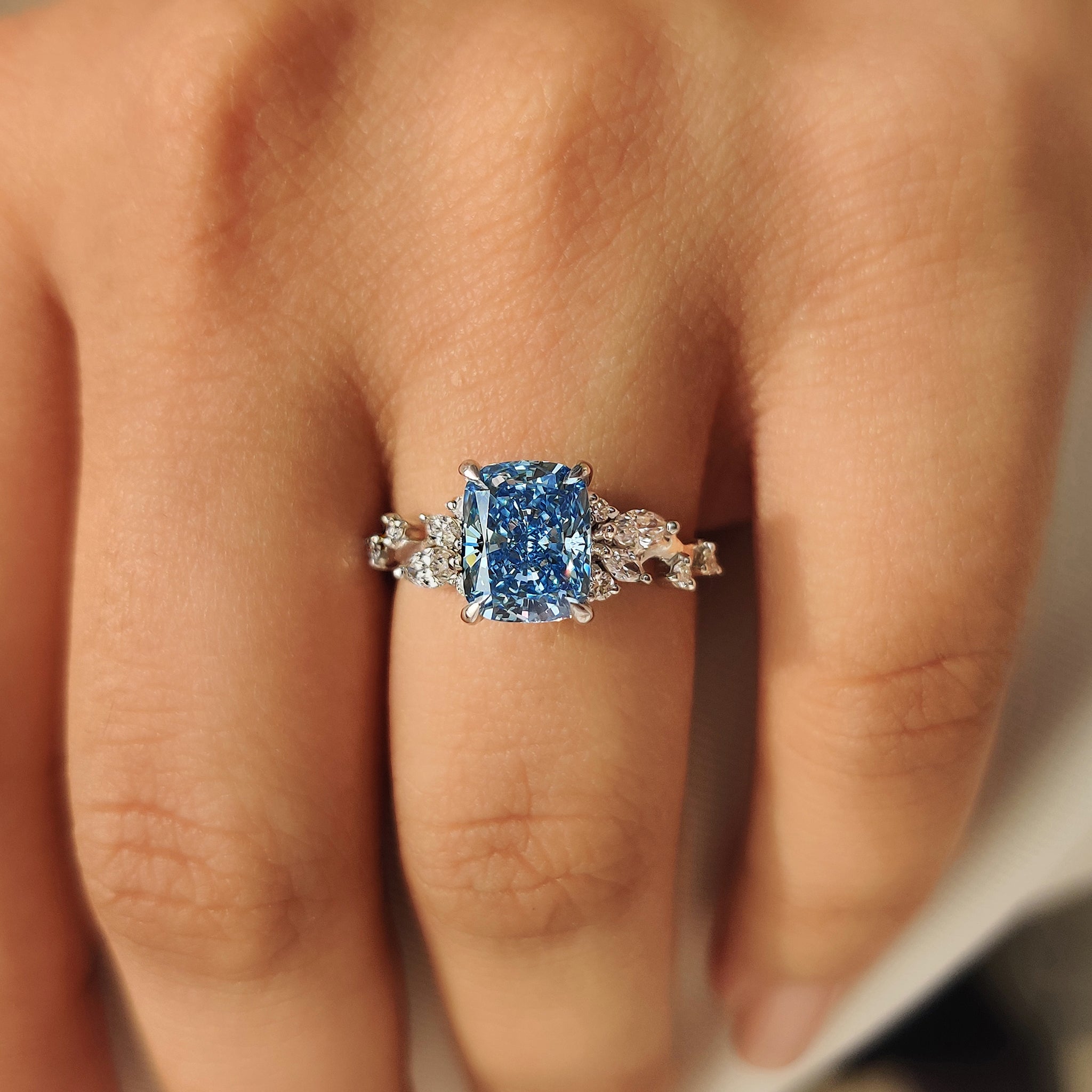 Blue Cushion Cut Diamond Ring in Cluster Setting
