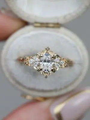 Briar rose starlight oval center Whimsical gold engagement ring DisneyValley
