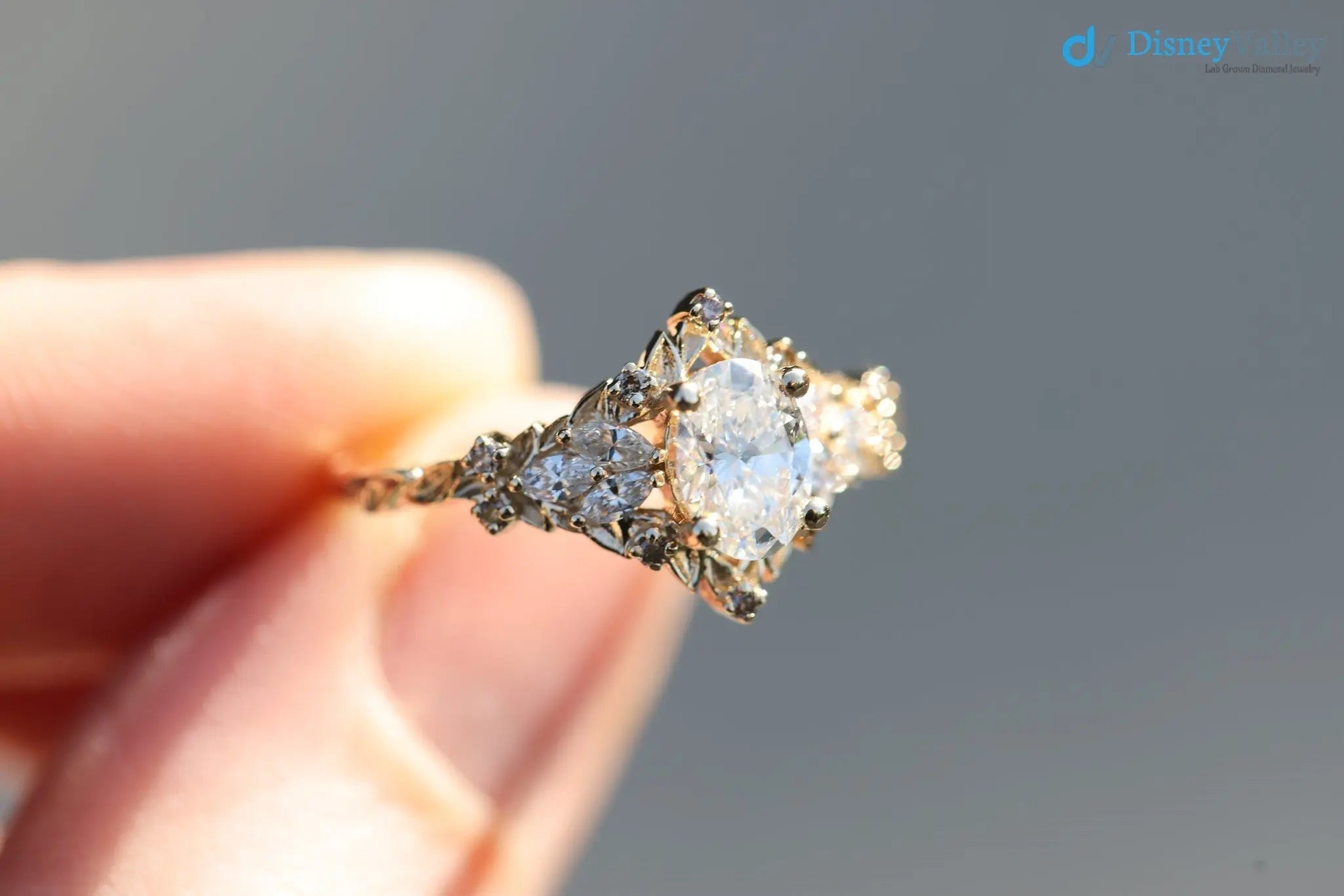 Briar rose starlight oval center Whimsical gold engagement ring - DisneyValley