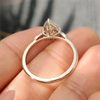 Marquise Cut Diamond Ring with Round Side Stones