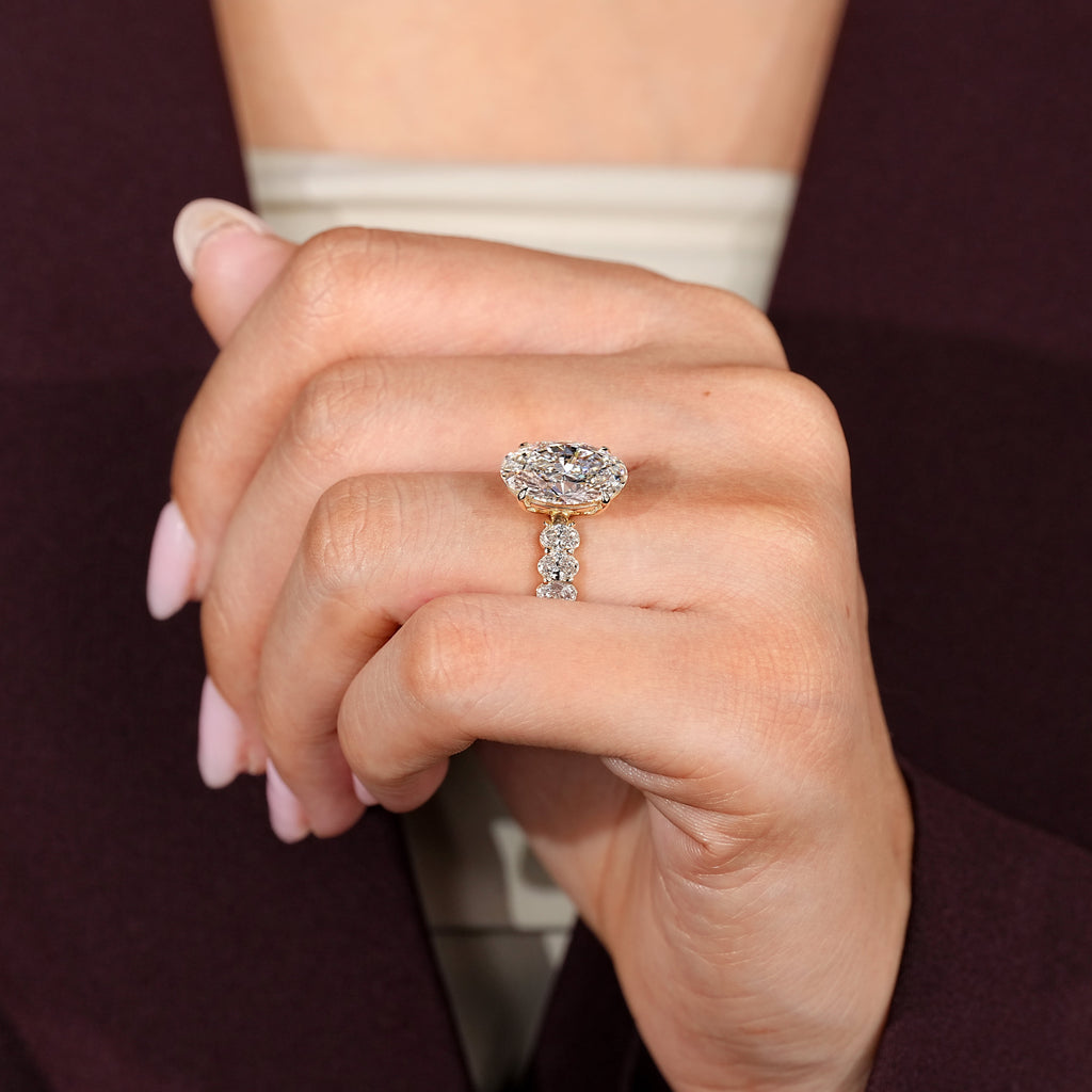 Oval Engagement Ring with Four Claw Prong Setting