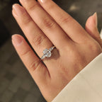 Oval Cut Diamond Ring with Round Side Stones