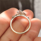 Nature Inspired Marquise Cut Engagement Ring with Round Side Stone