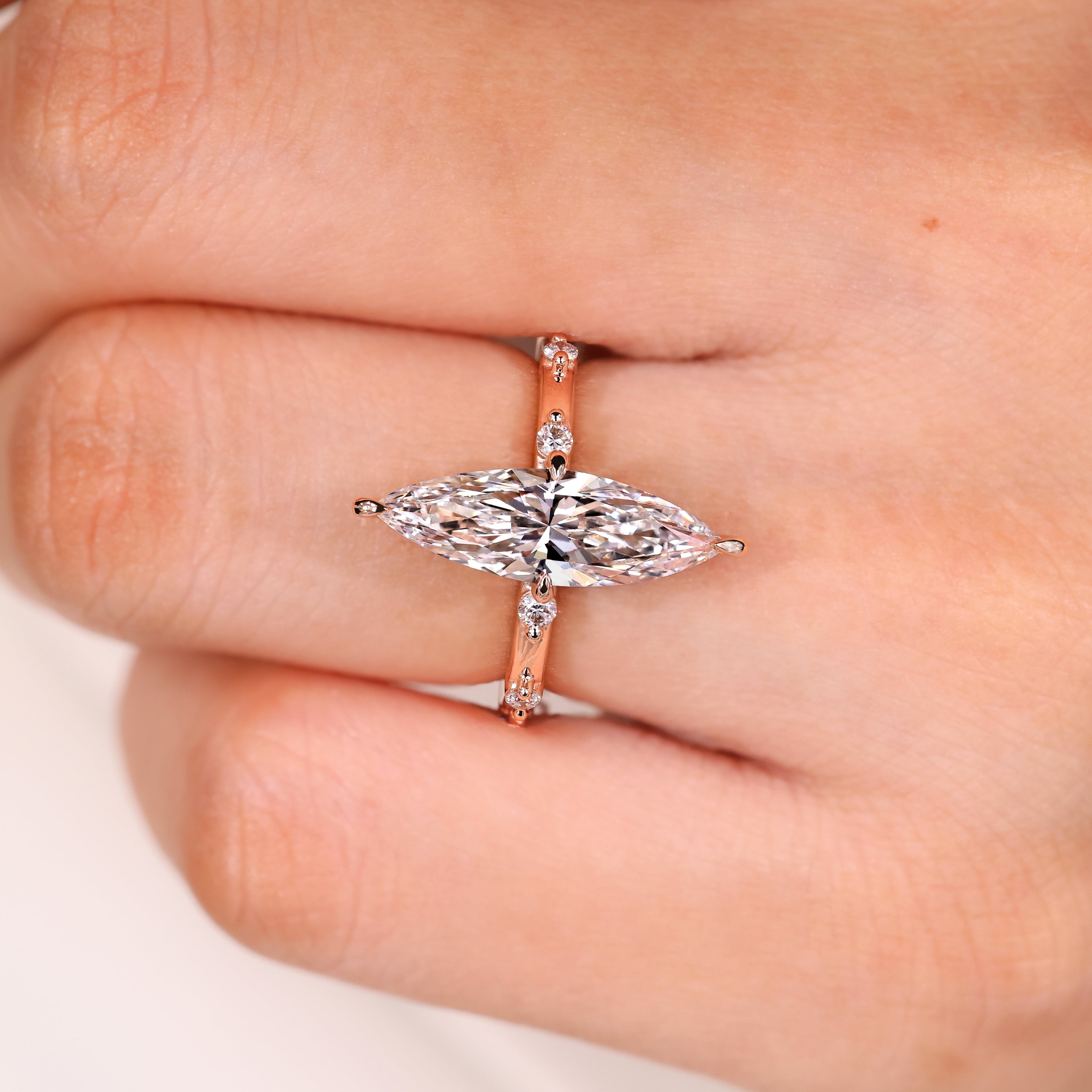 Elongated Marquise Engagement Ring In Distance Pave Style