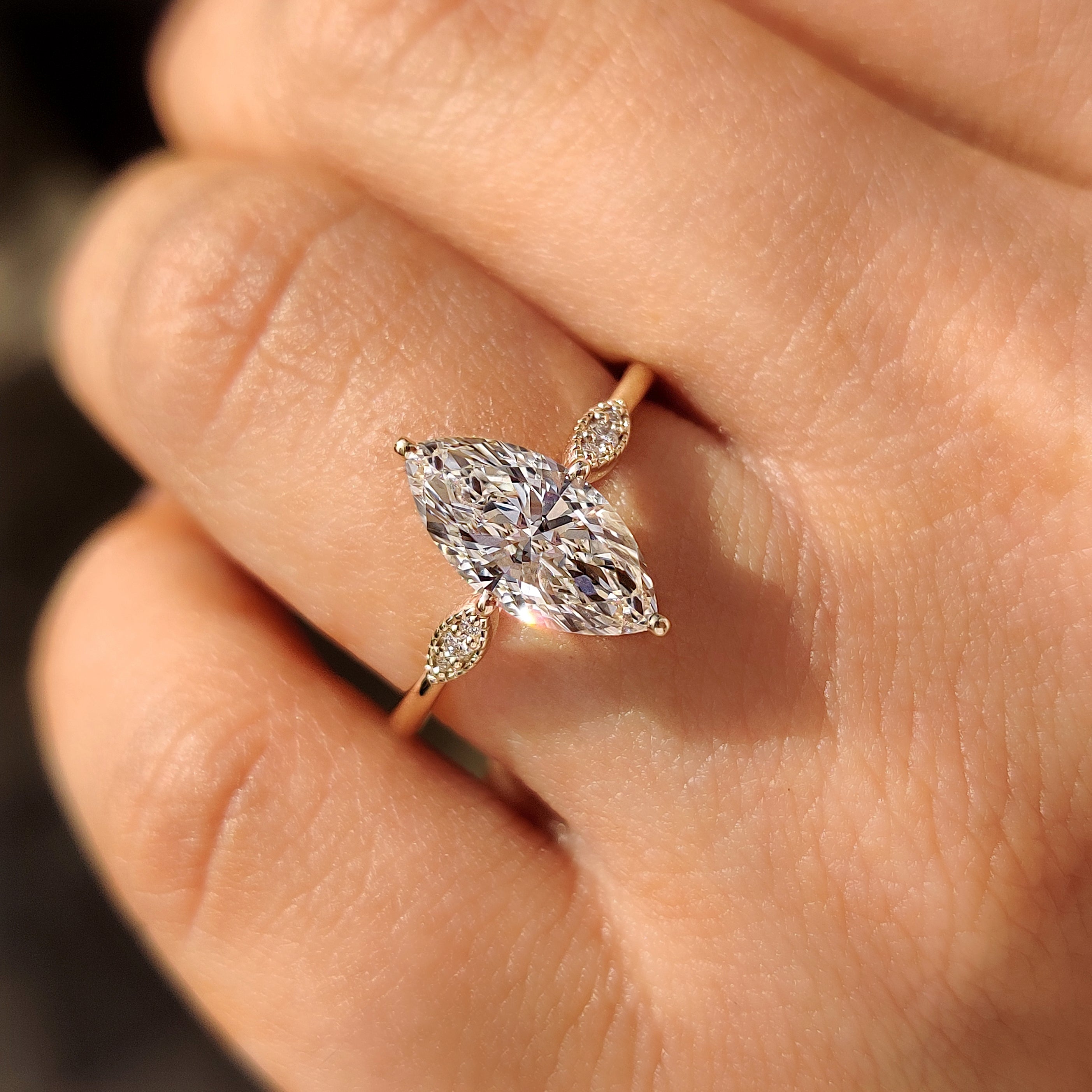 Marquise Cut Diamond Ring with Round Side Stones Secondary image