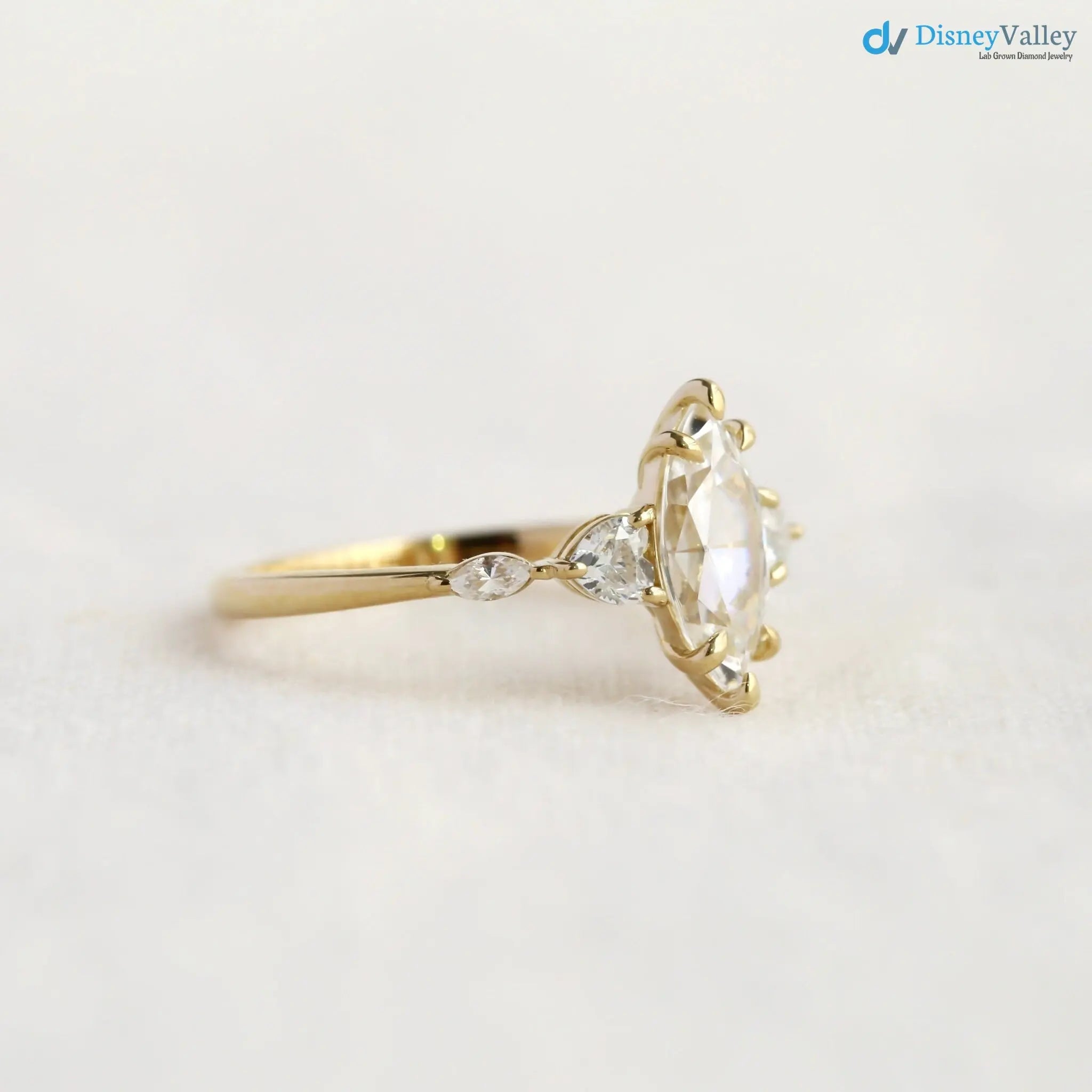 Cupid’s arrow ring, engagement ring, marquise ring, moissanite ring DisneyValley