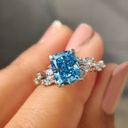 Blue Cushion Cut Diamond Ring in Cluster Setting