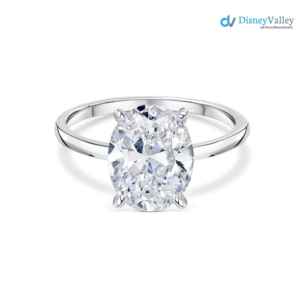 Anillo de compromiso con halo oculto de moissanita ovalada