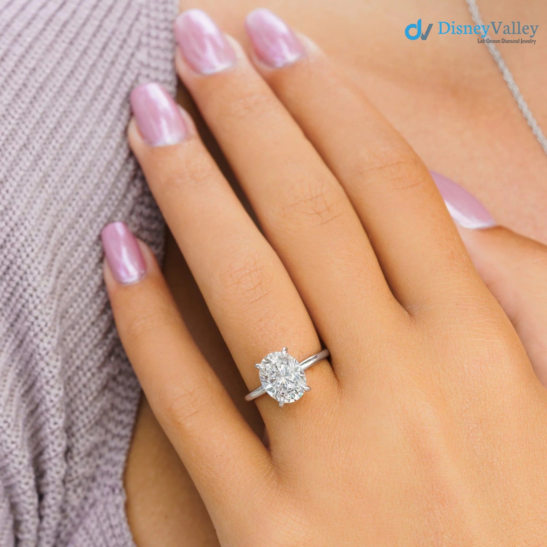 Oval Moissanite Hidden Halo Engagement Ring