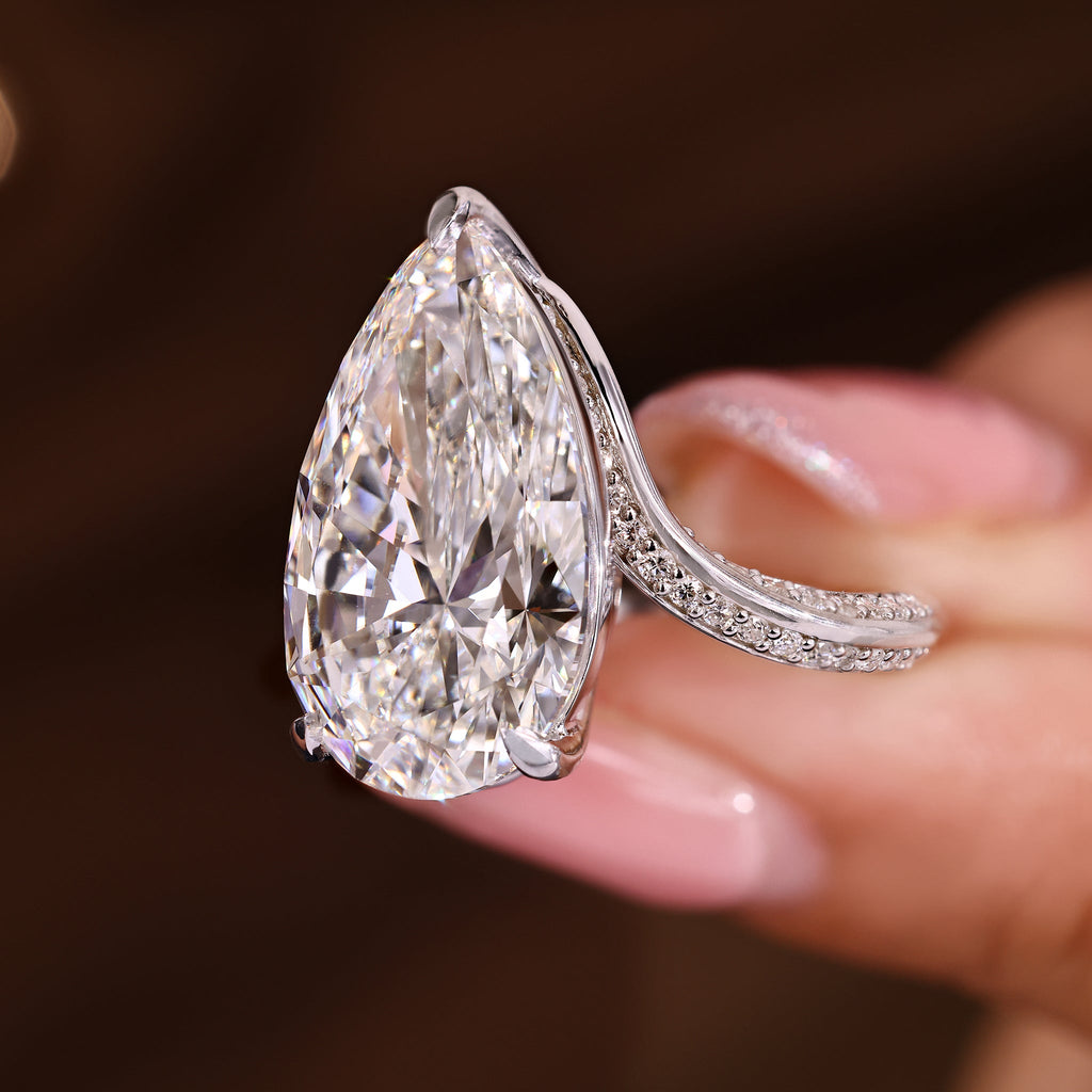 IGI Certified 10 - 12 Carat Pear Diamond Ring in Bypass Setting