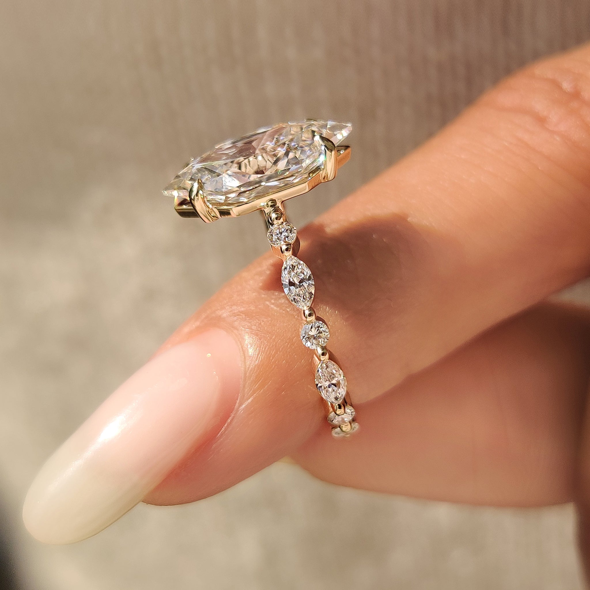 Dutch Marquise Engagement Ring in Shared Prong Pave Setting
