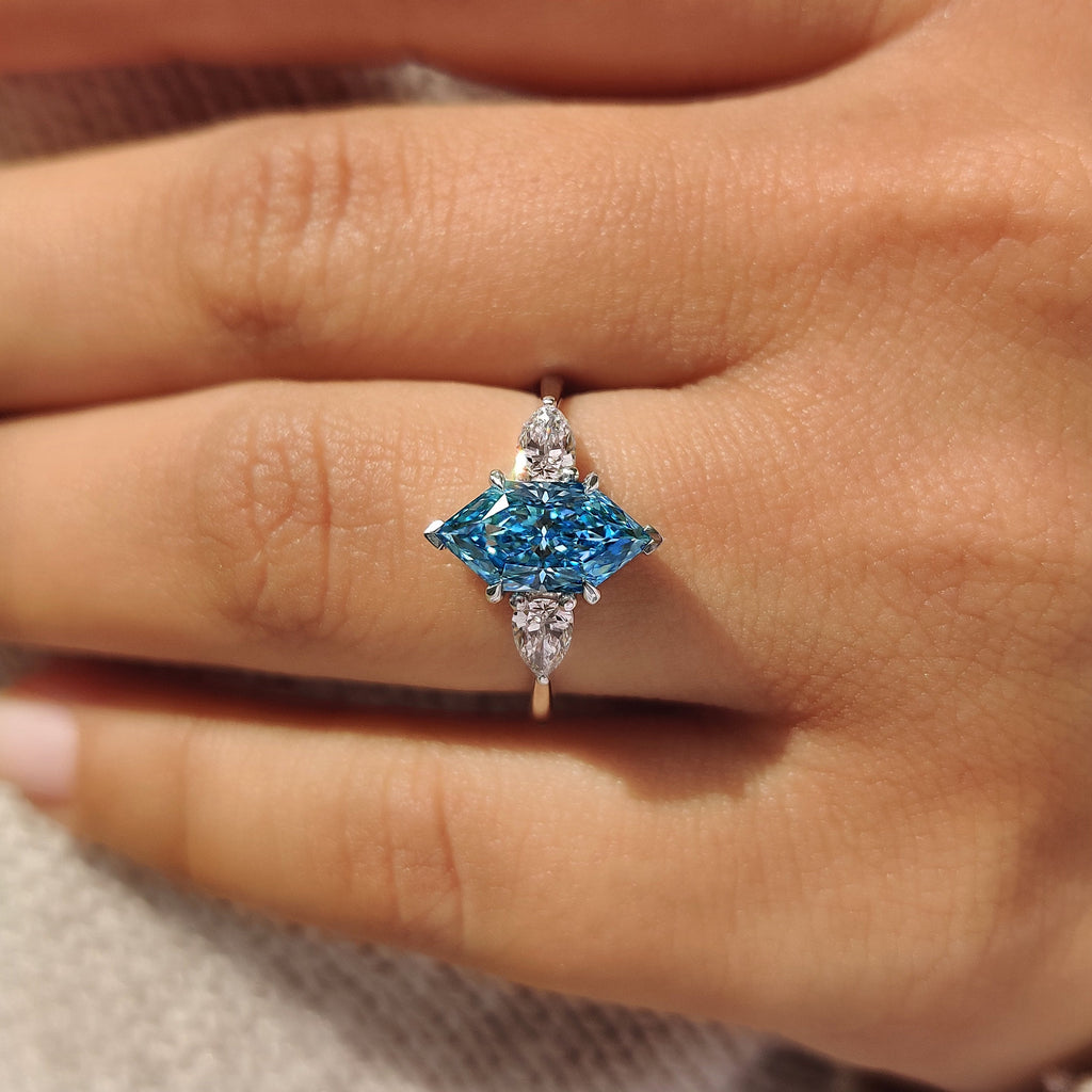 Blue Dutch Marquise Three Stone Ring with Pear Side Stones