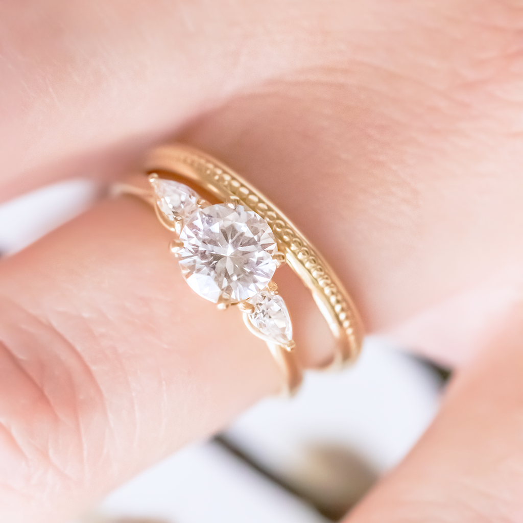 1.0 CT Round Cut Three Stone Style Moissanite Engagement Ring