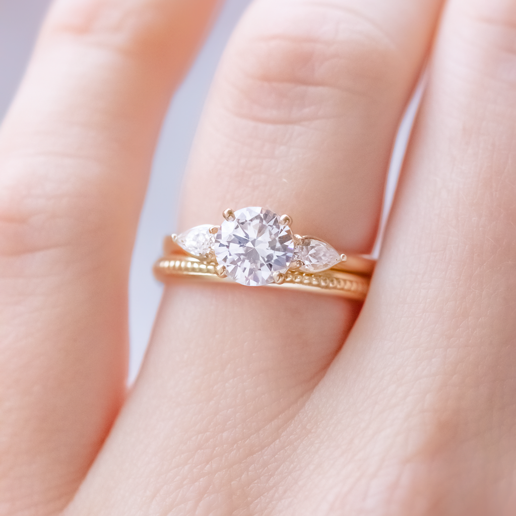 1.0 CT Round Cut Three Stone Style Moissanite Engagement Ring