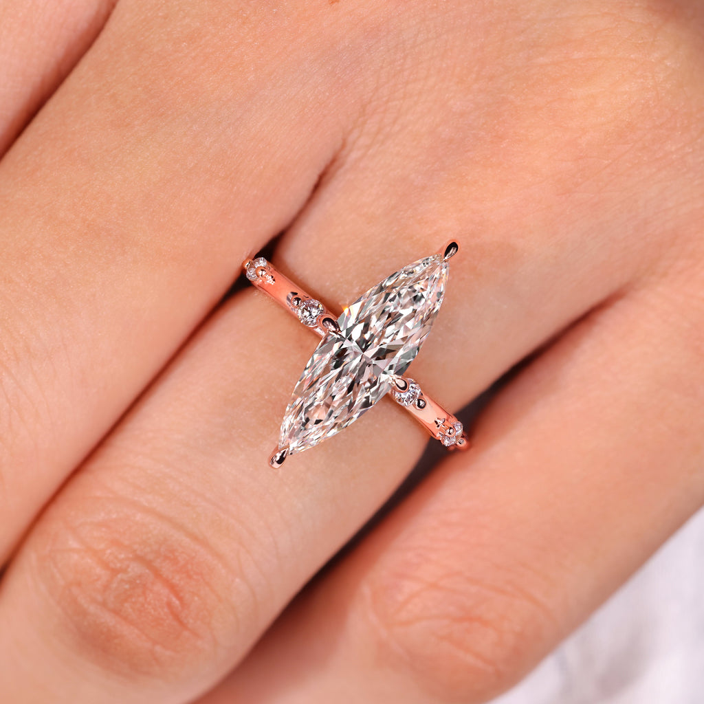 Elongated Marquise Engagement Ring In Distance Pave Style