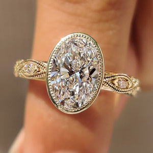 Oval Bezel Engagement Ring with Milgrain