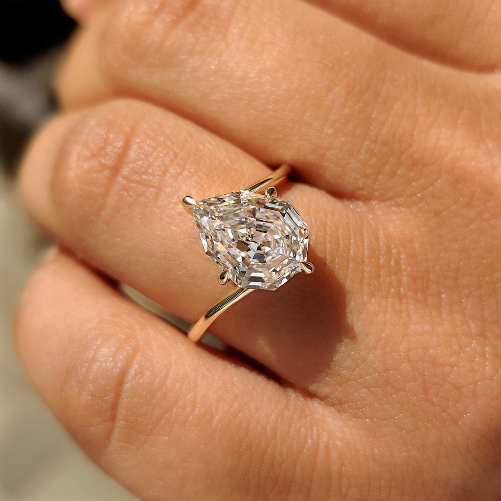 Pear Step Cut Diamond Solitaire Engagement Ring in Bypass Setting