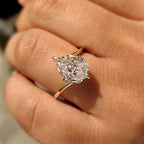 Pear Step Cut Diamond Solitaire Engagement Ring in Bypass Setting