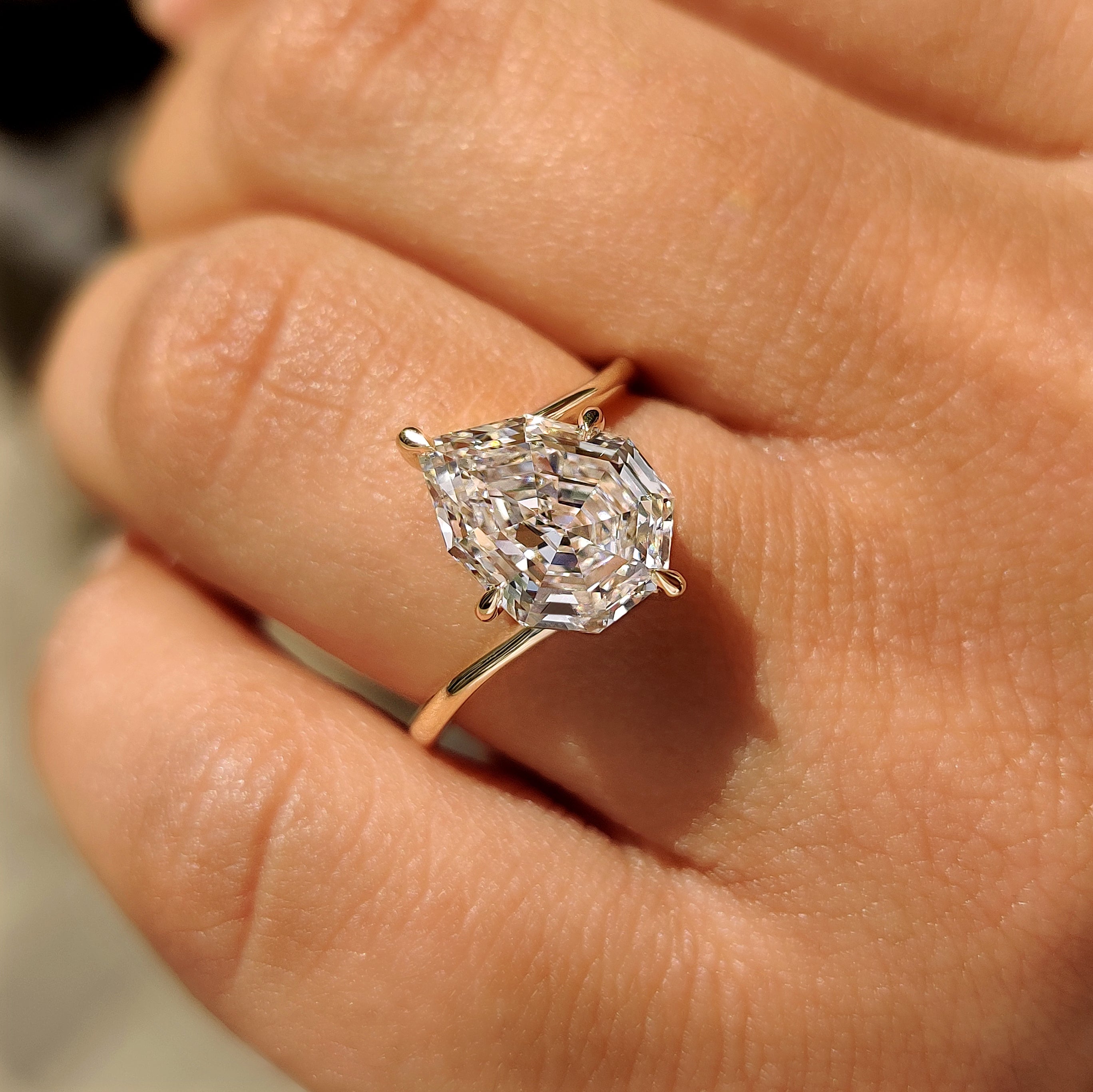 Pear Step Cut Diamond Solitaire Engagement Ring in Bypass Setting
