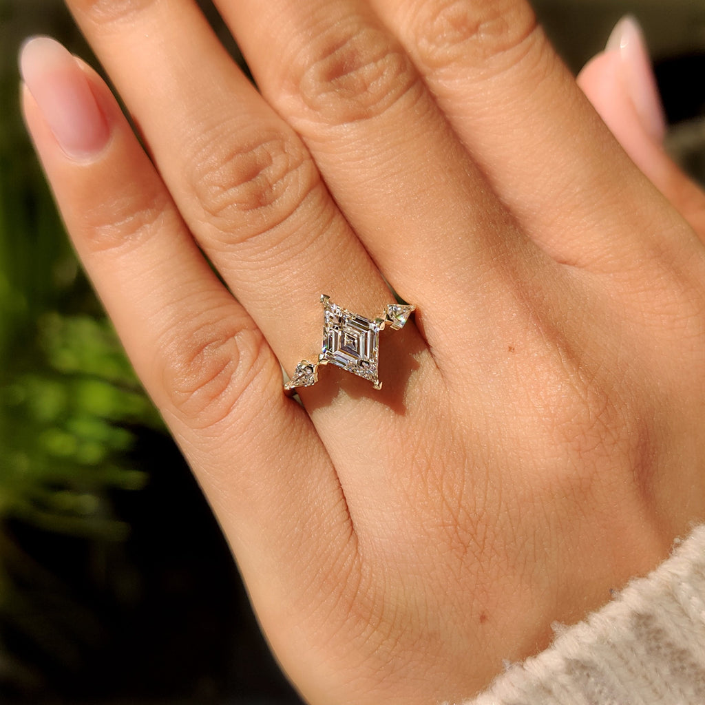 Lozenge Cut Engagement Ring with Kite Cut Side Stone