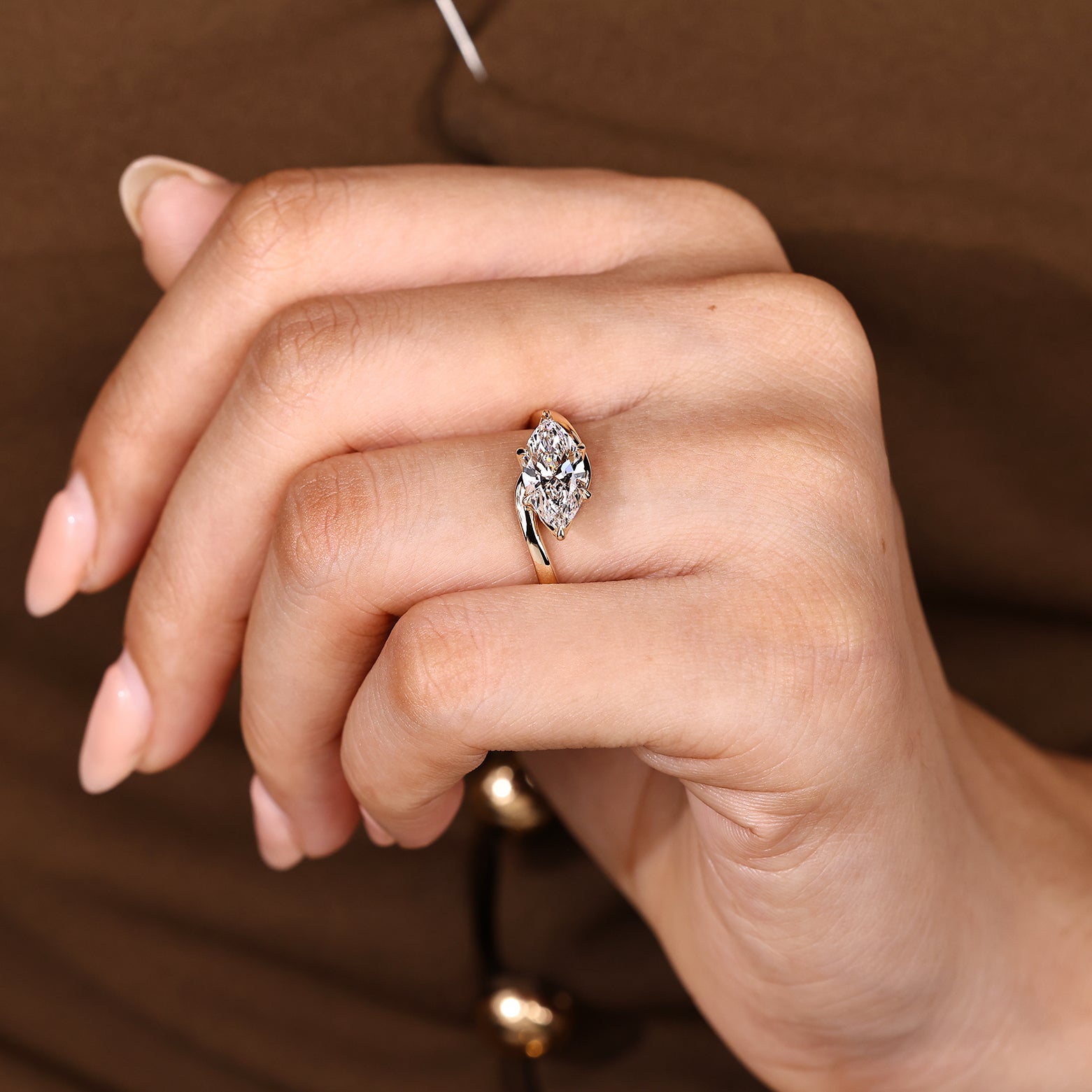 Solitaire Marquise Engagement Ring In East To West Setting