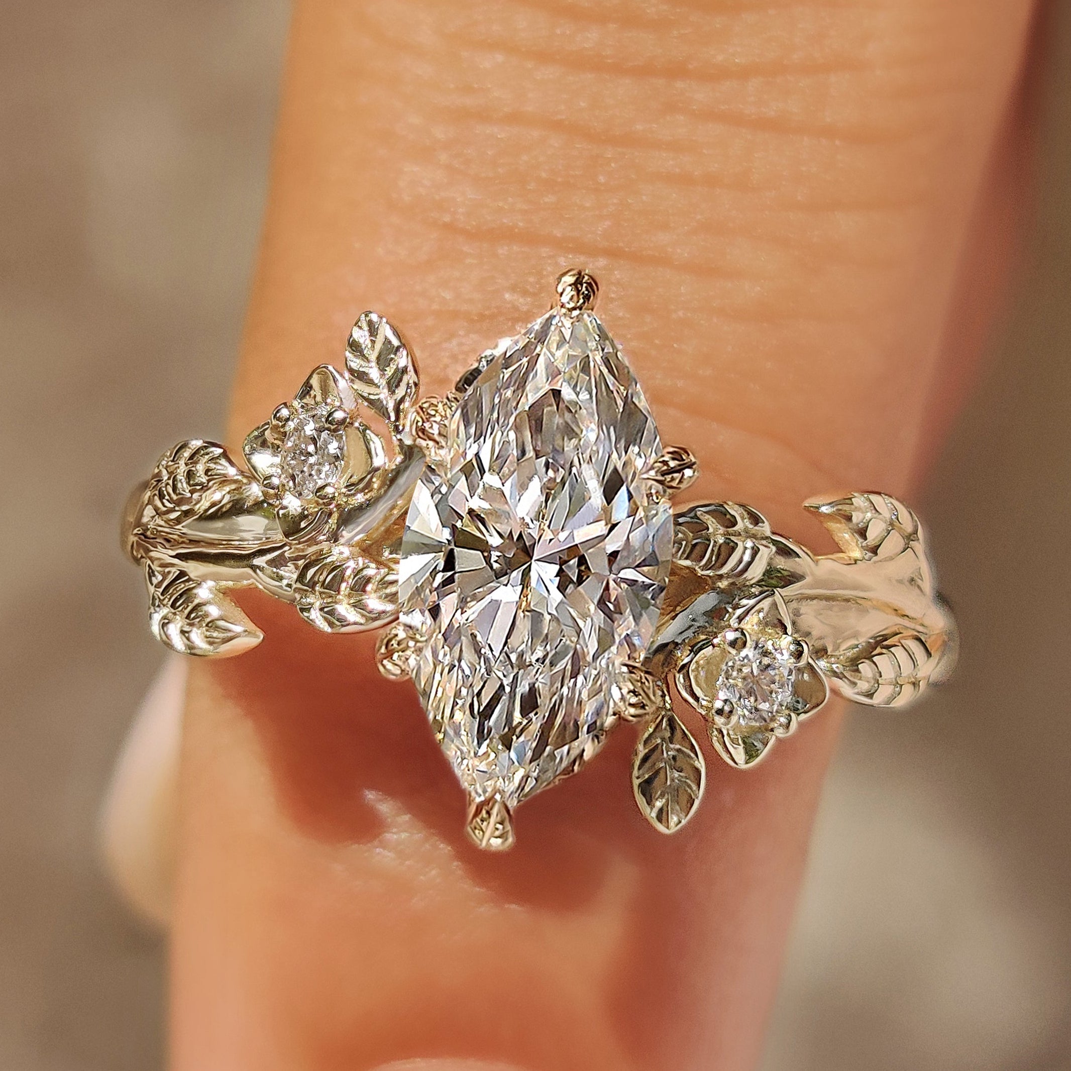 Nature Inspired Marquise Cut Engagement Ring with Round Side Stone Main image