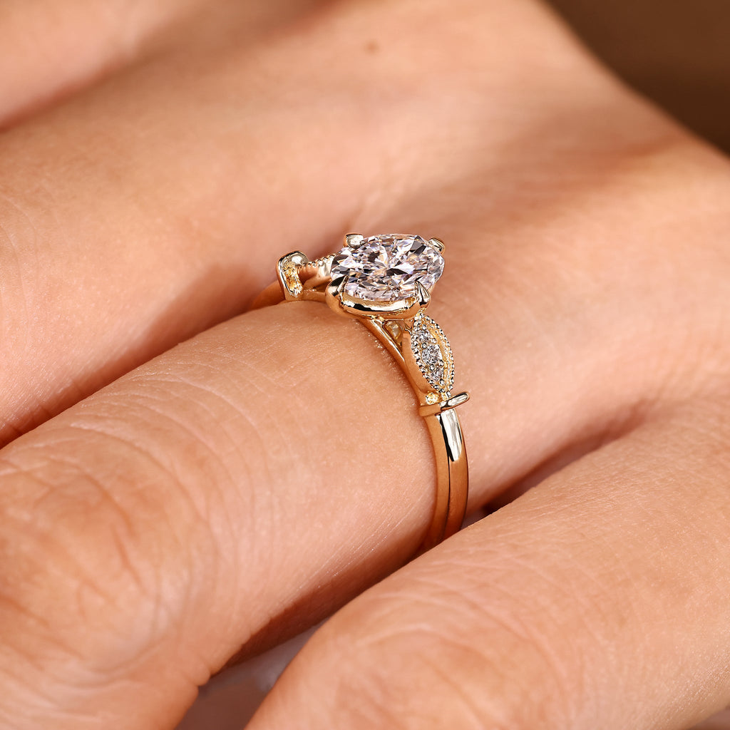 Oval Cut Diamond Ring With Round Side Stone Style