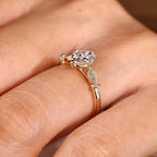 Oval Cut Diamond Ring With Round Side Stone Style