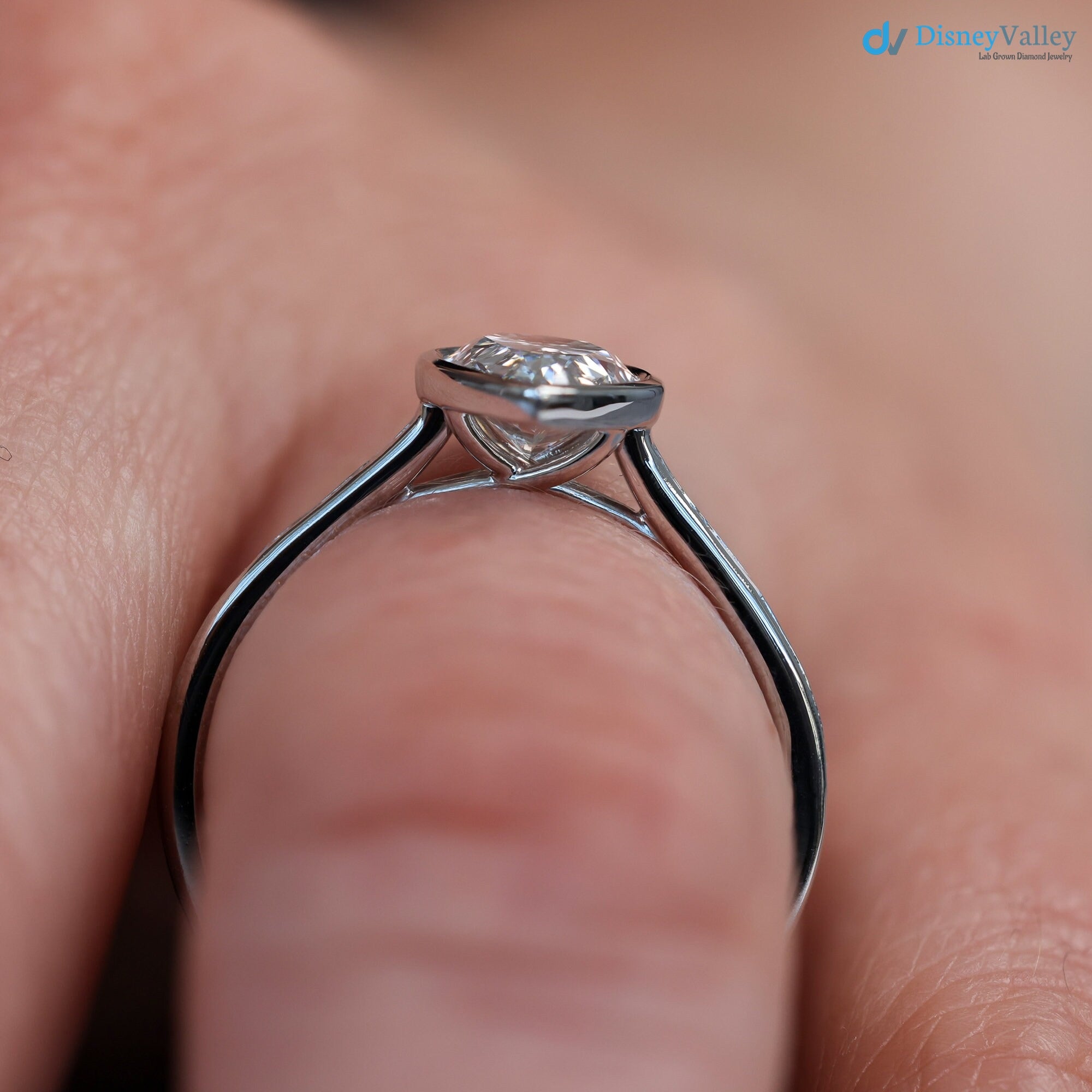 Pear Diamond Engagement Ring with Baguettes - Penelope: Bezel Set with Trellis and Channel Set - DisneyValley 