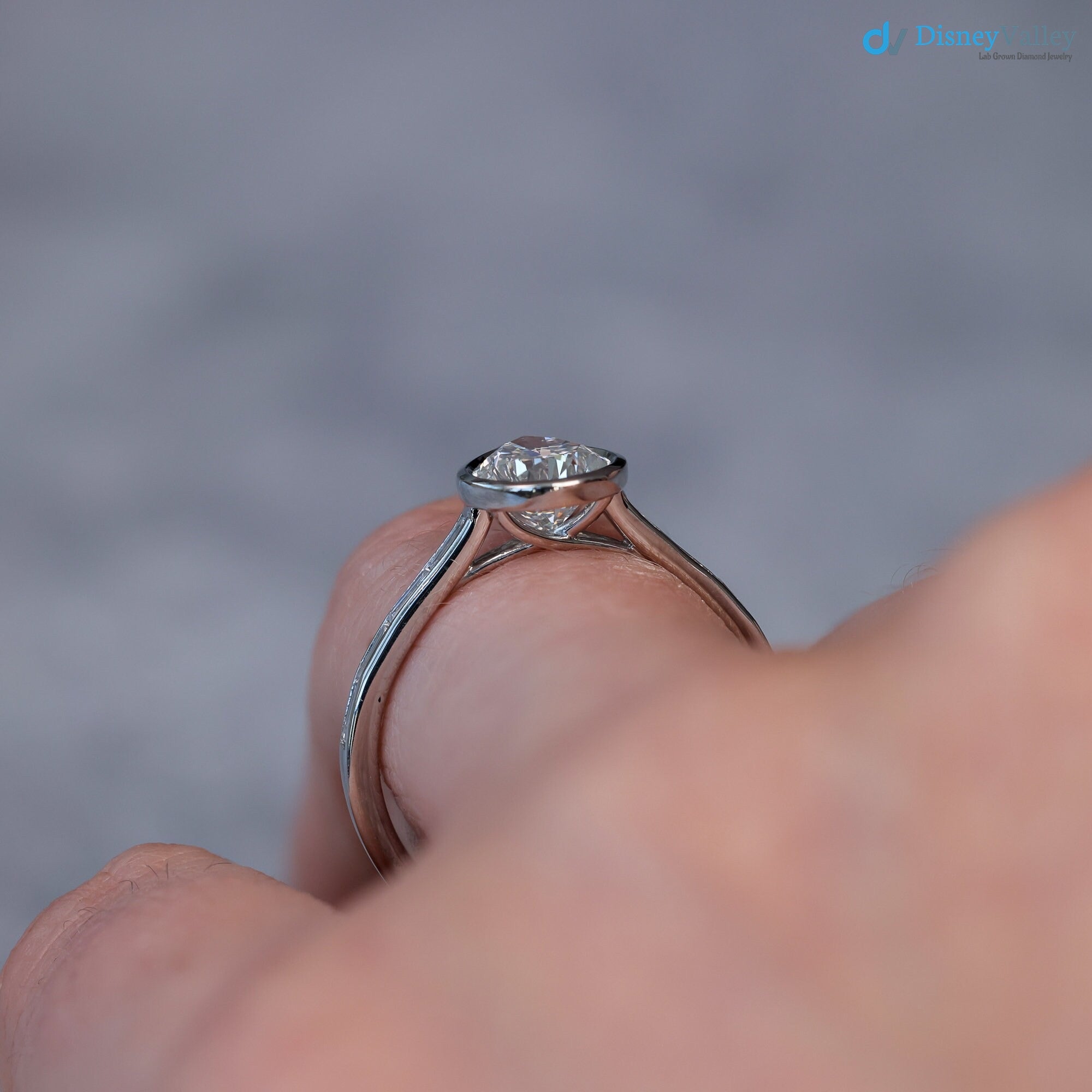 Pear Diamond Engagement Ring with Baguettes - Penelope: Bezel Set with Trellis and Channel Set - DisneyValley 