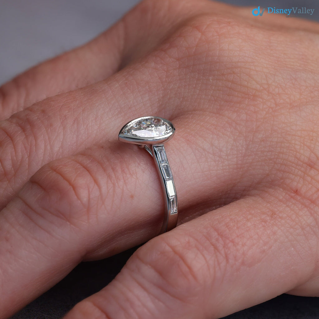 Pear Diamond Engagement Ring with Baguettes - Penelope: Bezel Set with Trellis and Channel Set - DisneyValley 