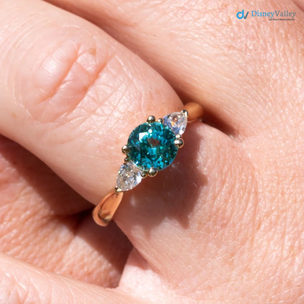 The Sophia Ring 1.98ct Brilliant Cut Paraiba Tourmaline Trilogy engagement ring