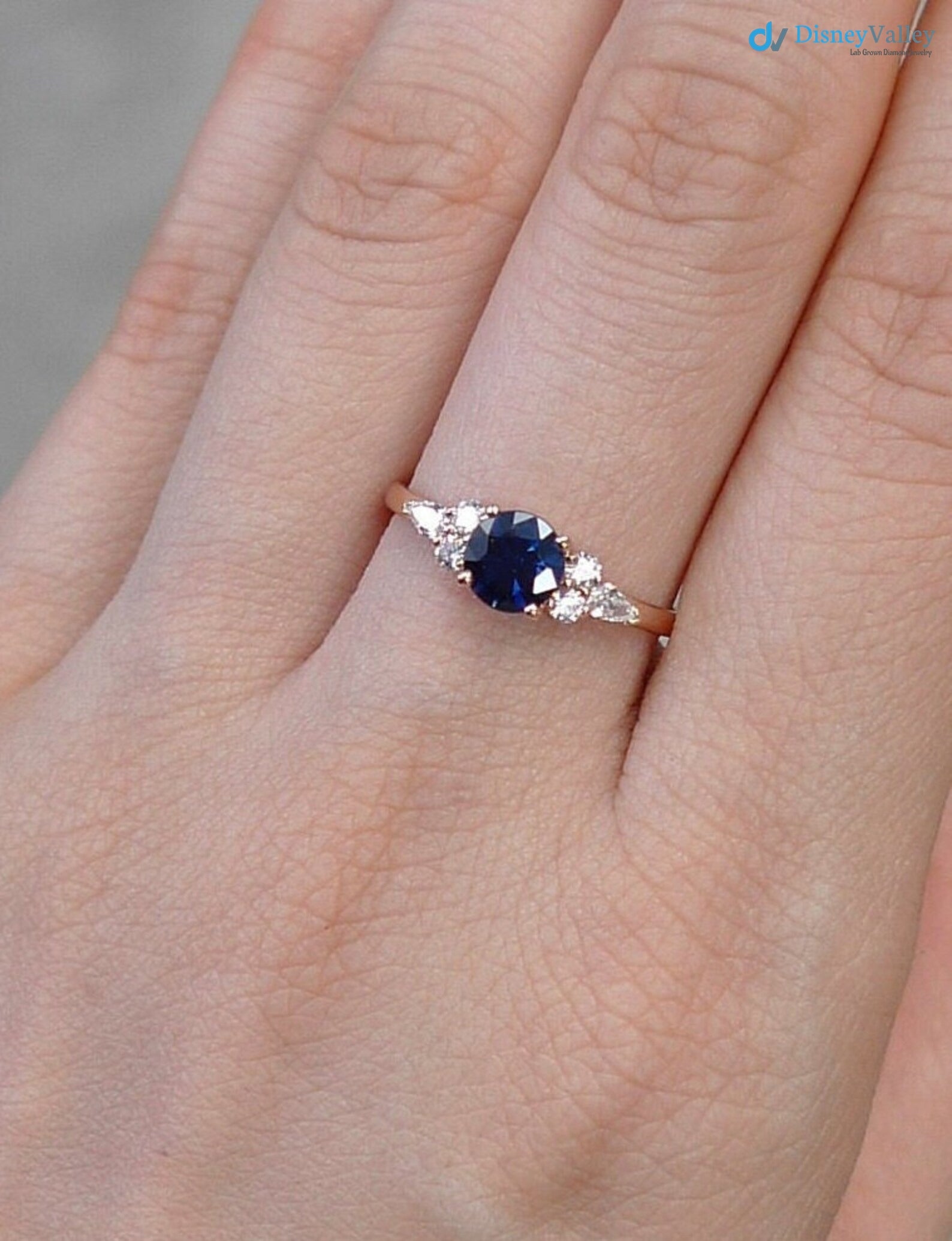 Unique Blue Sapphire and Pear Diamond Engagement Ring Secondary image