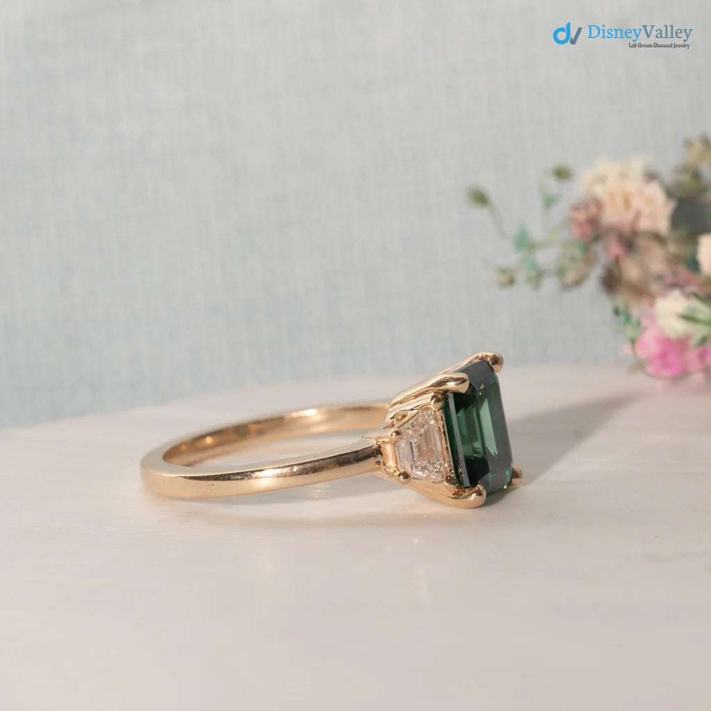 The Evelyn Ring 2.50ct Emerald Cut Green Trapezoid Lab Diamond Trilogy 9k Yellow Gold