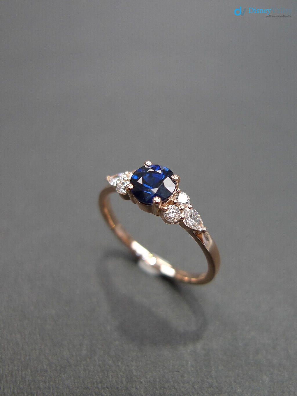 Unique Blue Sapphire and Pear Diamond Engagement Ring - DisneyValley 
